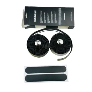 High quality bicycle handlebar tape set with plugs and adhesive strips for road bikes.