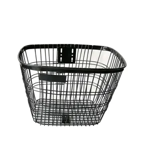 Detailed close-up view of black metal wire bicycle front basket with mounting bracket