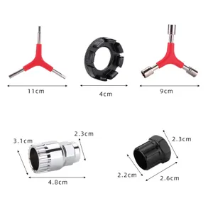 Bicycle repair tool set including Y-wrench, bottom bracket remover, and cassette lockring tool.