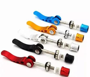 Close-up of colorful bicycle quick release skewers, aluminum alloy seatpost levers.