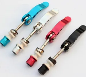 Detailed view of colorful bicycle quick release skewers, aluminum alloy seatpost clamp bolts.