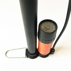 Detailed view of portable floor air pump with clear pressure gauge dial and dual units.