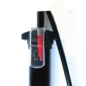 Close-up detail view of the floor air pump valve cover with transparent cap and nozzle.