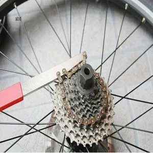 Bicycle cassette removal tool detail view, chain whip and lockring socket for maintenance.