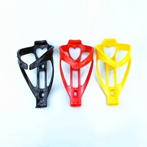 Portaborraccia da bicicletta in plastica con design a cuore, ideale per mountain bike e strada.