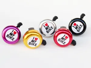 Colorful mini bicycle bell set detail view, metal handlebar ring for mountain and kids bikes.