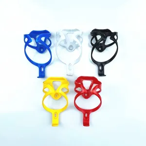 Lightweight plastic bicycle water bottle cage, durable cycling cup holder detail view.