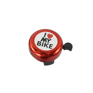 Red aluminum bicycle bell with heart and text design, clear sound and durable quality for bikes.