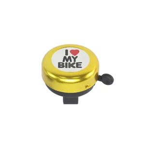 Close-up detail of the mini bicycle bell with golden aluminum cover and heart bike text.
