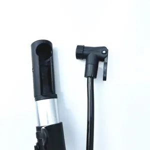 Close-up detail shot of the portable high-pressure air pump hose and alloy body structure.