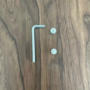 Detail view of bicycle water bottle cage hex wrench and mounting screws accessories.
