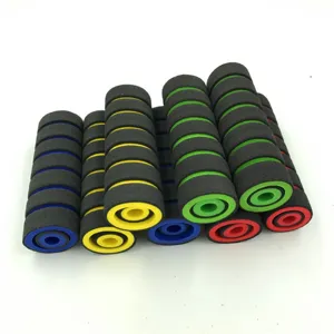 Motorcycle modification foam handlebar grips detail shot, soft sponge material with colorful rings.