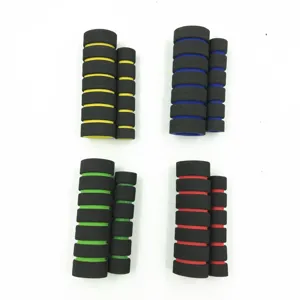 Detailed view of motorcycle sponge handlebar grips in multiple vibrant colors, soft foam material.