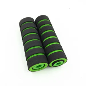 Black green motorcycle sponge handlebar grips detail view, soft foam non-slip design.