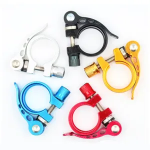 Detailed close-up view of colorful aluminum alloy bicycle seatpost clamps with quick release.