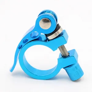 Detailed view of a blue aluminum alloy bicycle seatpost clamp with quick release lever.