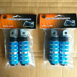 Detailed view of blue and silver aluminum alloy motorcycle foot pedals with textured grip design.