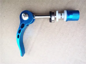 Blue aluminum alloy bicycle quick release skewer lever detail view for mountain bikes.