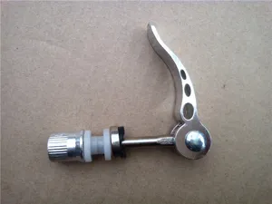Detail view of silver bicycle quick release skewer with lever, washer, and nut components.