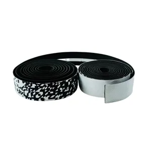 Close-up of road bike handlebar tape detail showing black white gradient texture pattern.