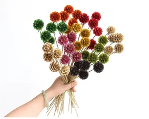 Detail view of colorful dried scabiosa flower bouquet, natural DIY material for home floral decor.