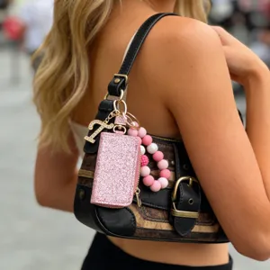 Mini bolso rosa con purpurina y pulsera de cuentas charm para accesorio de bolso
