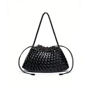 Black woven leather shoulder bag detail, elegant braided strap and drawstring closure design.
