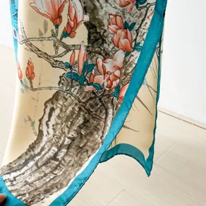 Silk scarf detail Chinese floral print elegant retro fabric texture close up product view