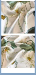 Dettaglio foulard in seta, elegante motivo di fior di loto, tessuto morbido, bordo verde.
