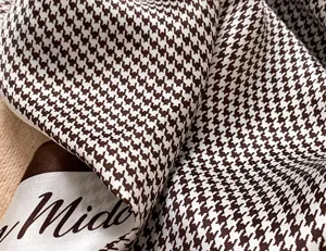 Brown houndstooth silk scarf detail, elegant neckerchief for women and daily wear.