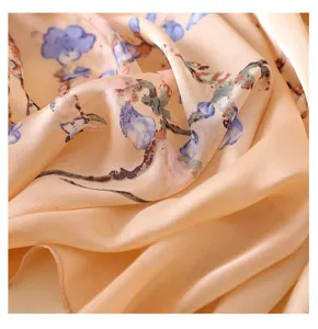 Detailed view of women silk scarf with oil painting floral print and soft texture