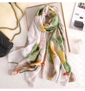 Elegant floral imitation silk scarf, mid-length design for women, perfect for travel styling.
