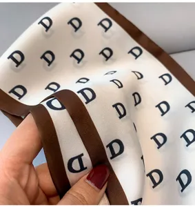 Silk scarf with letter print, elegant neckerchief for women, fashion accessory for bags or hair.