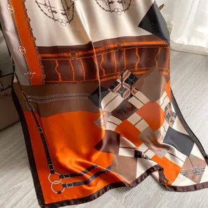 Elegant silk-like long scarf with chic chain and belt print for women's daily fashion.