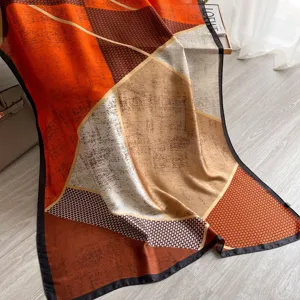 Color-blocked geometric print scarf, stylish summer beach shawl and lightweight silk wrap.