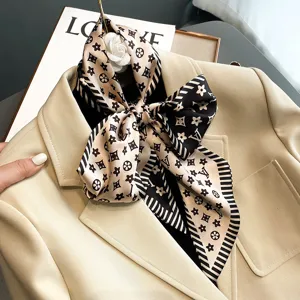 Close-up view of the exquisite floral print silk scarf ribbon, perfect elegant neck accessory.