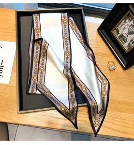 Elegant long silk twilly scarf with vintage chain pattern for women's chic neck and bags.