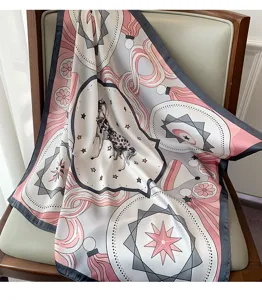 Detailed shot of the printed square scarf with elegant horse motif and stylish grey border.