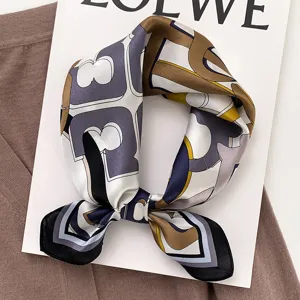 Luxury silk square scarf for women, elegant geometric print neck scarf and hair accessory.