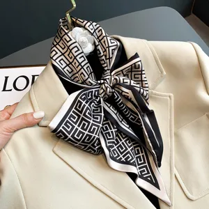 Black and white geometric print silk scarf, elegant spring and autumn neckwear accessory.