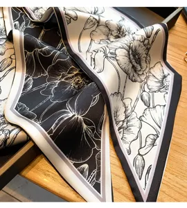Foulard en similicuir à imprimé floral noir et blanc, élégant bandeau ou tour de cou.