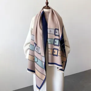 Chic reversible cashmere-feel winter scarf with elegant buckle print and stylish fringe.