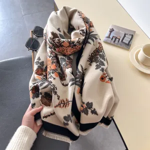 Beige cashmere-feel jacquard scarf for women, featuring elegant floral pattern and fringe hem.
