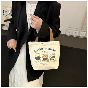 Canvas tote bag with cute bear print, compact daily lunch bag and stylish hand purse.