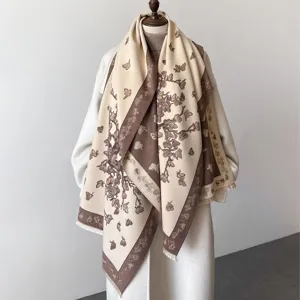 Detailed view of the cozy autumn winter butterfly print cashmere feel thick shawl scarf edge.