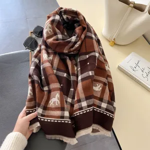 Cozy brown plaid winter scarf for women featuring elegant white horse print and stylish fringe.
