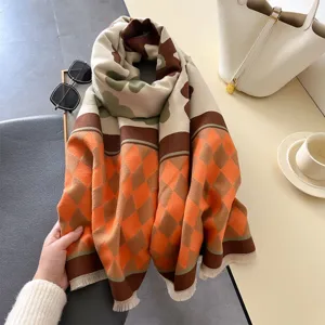 Cozy winter cashmere-feel scarf with chic diamond pattern and stylish fringe design.