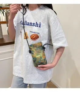 Chinese style retro crossbody phone bag featuring landscape painting design and adjustable cord.