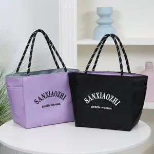 Waterproof large capacity tote shoulder bag, stylish daily commuting casual handbag for women.