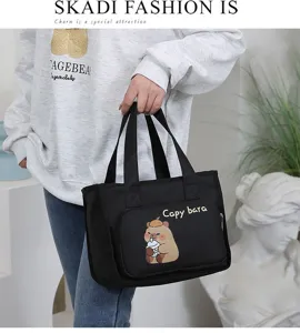 Black canvas lunch bag with cute capybara print, large capacity commuter bento handbag.